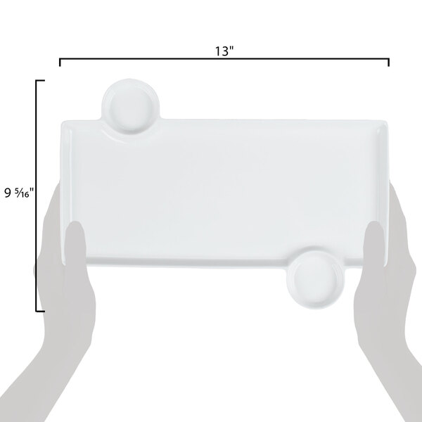 An American Metalcraft white rectangular porcelain tray with built-in sauce cups.