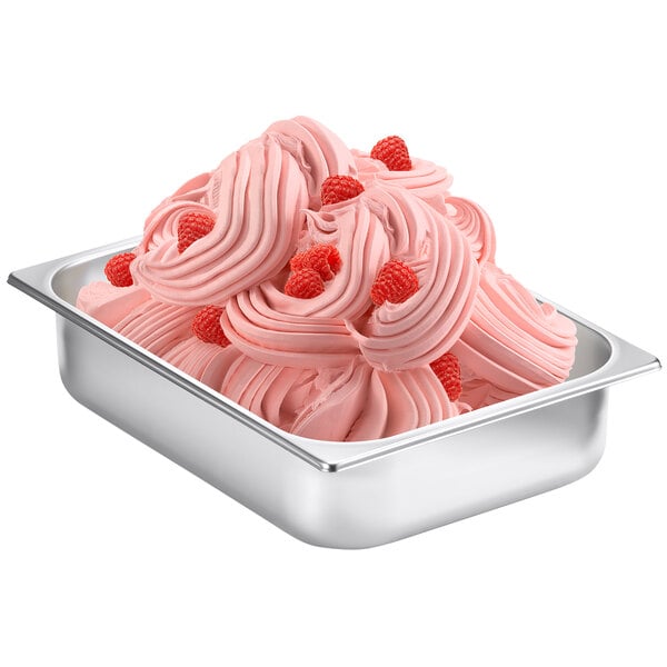 A metal pan of pink ice cream flavored with Fabbri Raspberry Flavoring.
