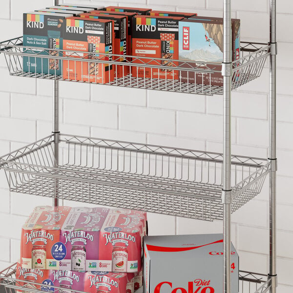 A Regency chrome shelf with boxes and cans on it.