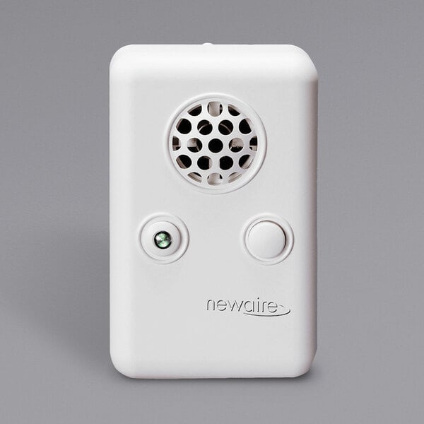 A white Newaire plugin ozone generator with a round hole on the front.