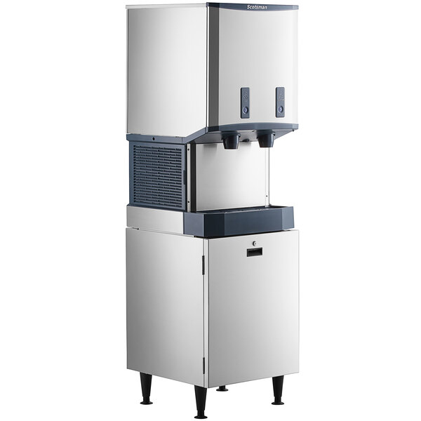 A Scotsman Meridian ice machine with a water dispenser and a cabinet stand.
