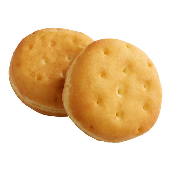 Two Rich's unfilled round donut shells on a white background.