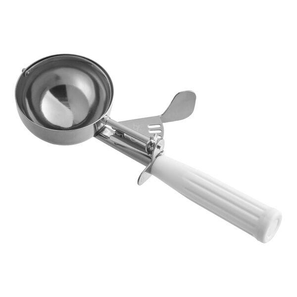 A stainless steel ice cream scoop with a white plastic handle and thumb press mechanism.