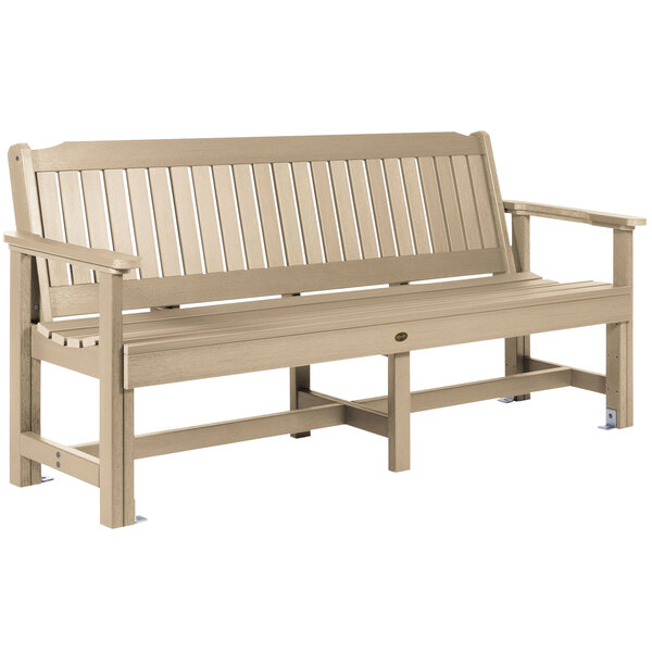 A Tuscon Taupe faux wood garden bench with arms.