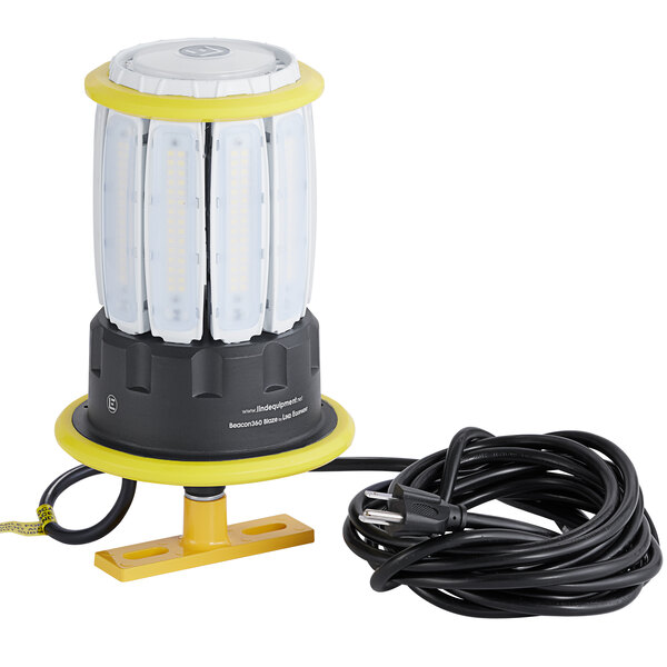 A yellow and black Lind Equipment Beacon360 Blaze LED portable area light.