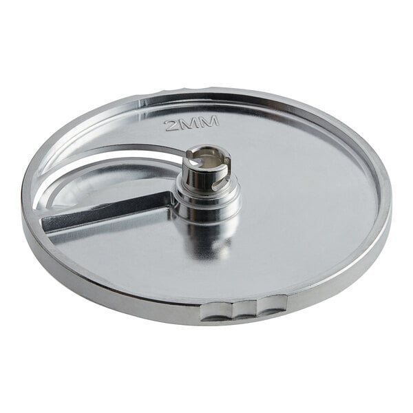 AvaMix 5/64" curved slicing plate for food processors with a circular metal object with a hole.
