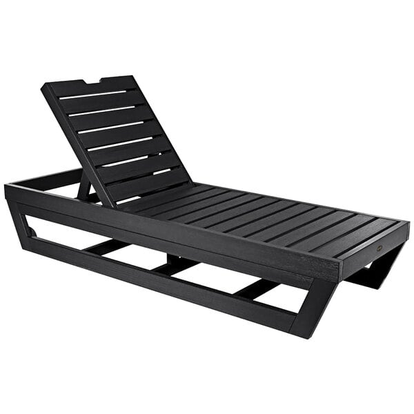 A black wooden chaise lounge chair by Highwood USA with a wooden frame.