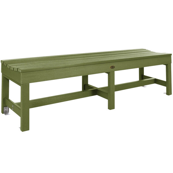 A dried sage green backless bench with legs.