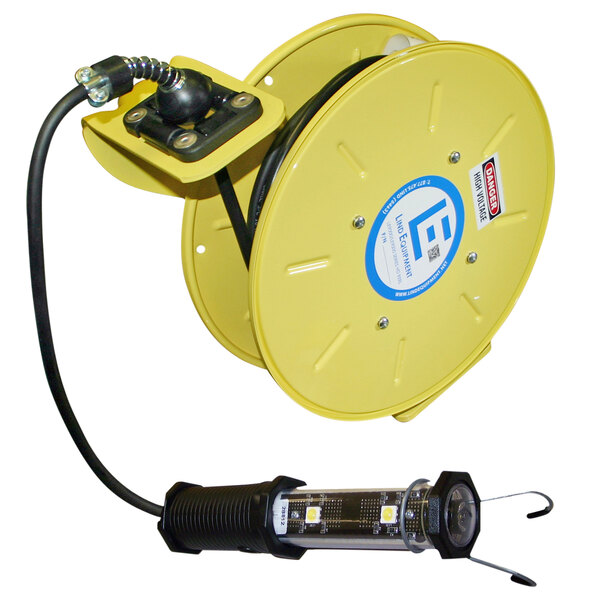 A yellow cord reel with a black cable attached to it and a light.