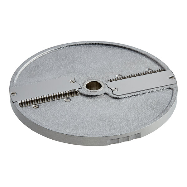 A circular metal AvaMix Julienne plate with two blades and a hole in the center.