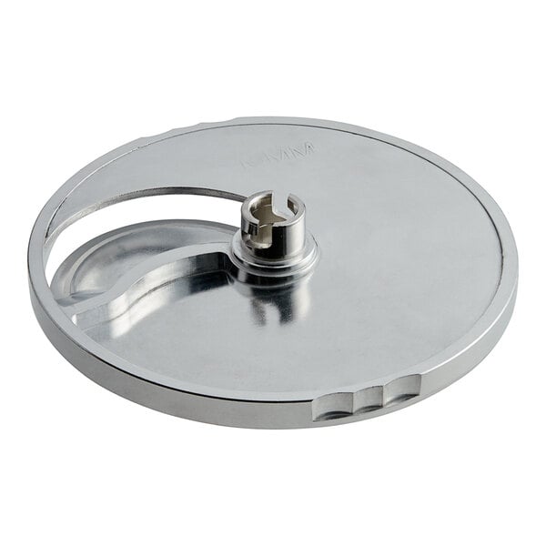 A curved stainless steel slicing plate with a hole in the center.
