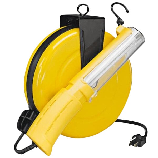 A yellow Lind Equipment work light on a reel with a cord.