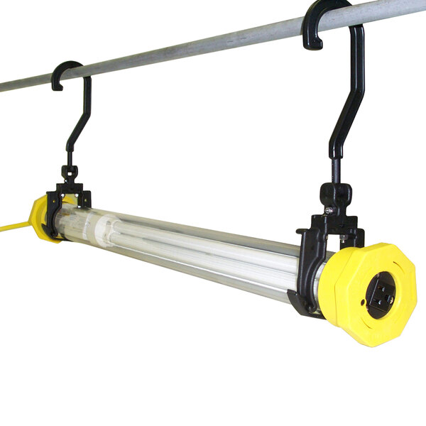 A Lind Equipment fluorescent work light with yellow handles and a long yellow tube.