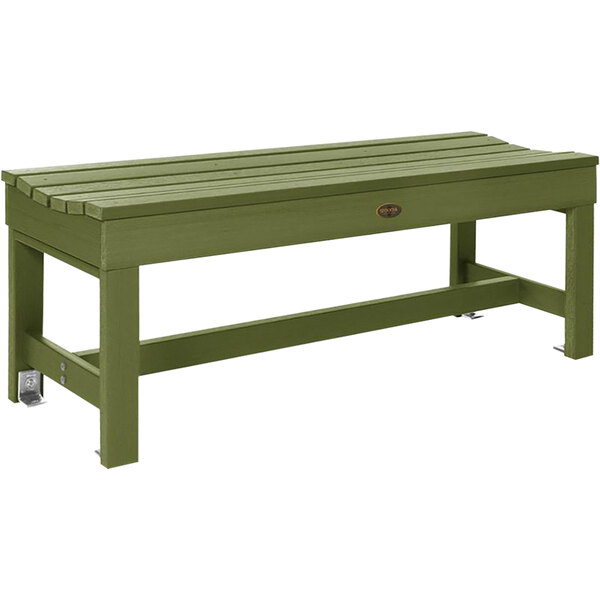 A dried sage green backless bench with faux wood slats.