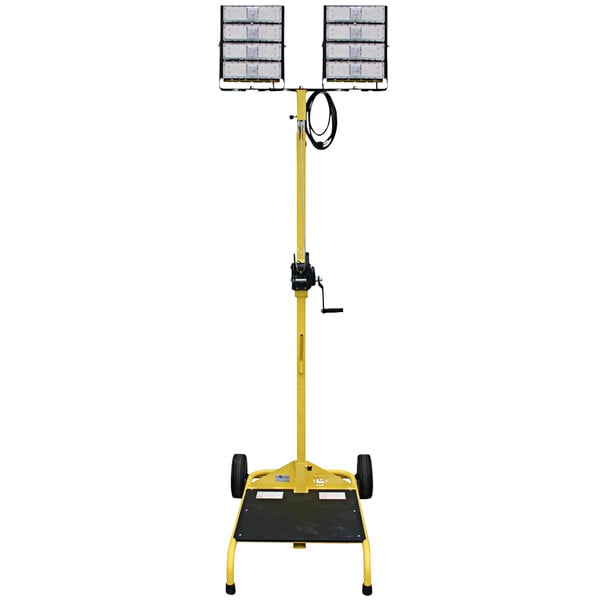 A yellow cart with a Lind Equipment LED dual head work light on a tall mast.