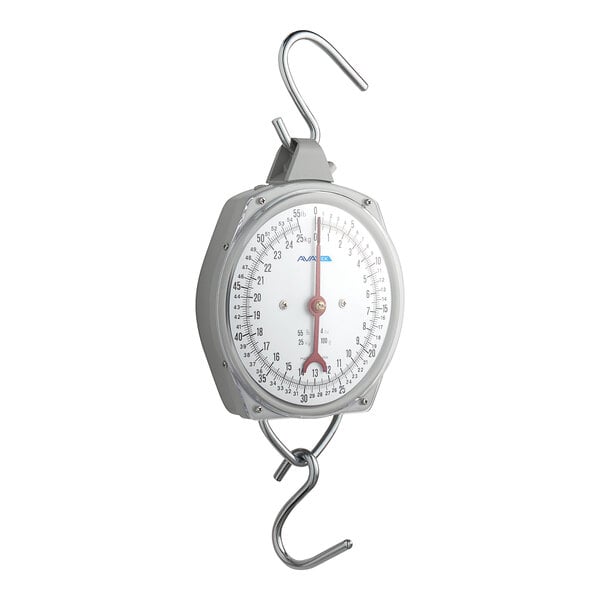 A mechanical hanging scale with a metal body, a large round dial, and two hooks for weighing items.