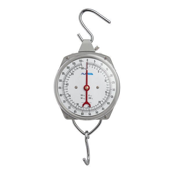 A round industrial hanging scale with a metal hook at the top and bottom for weighing items.