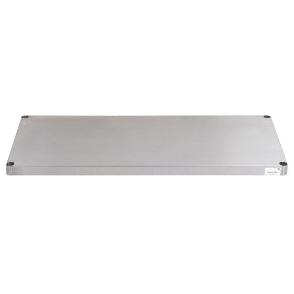 A rectangular stainless steel shelf with screws on a white background.