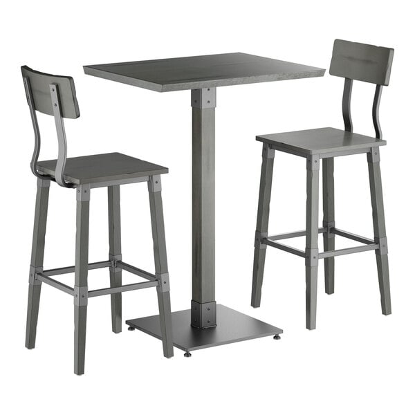 A bar-height table with a square top and two matching bar stools, all in a slate gray finish with metal accents.
