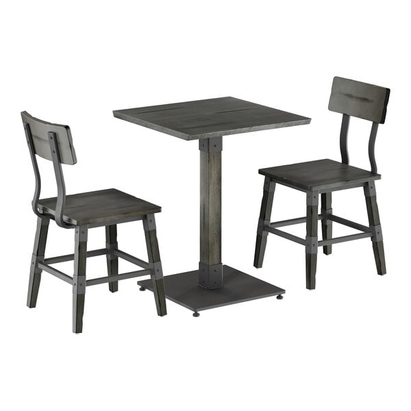 A square slate gray wood table with a metal base and two matching chairs with backs.