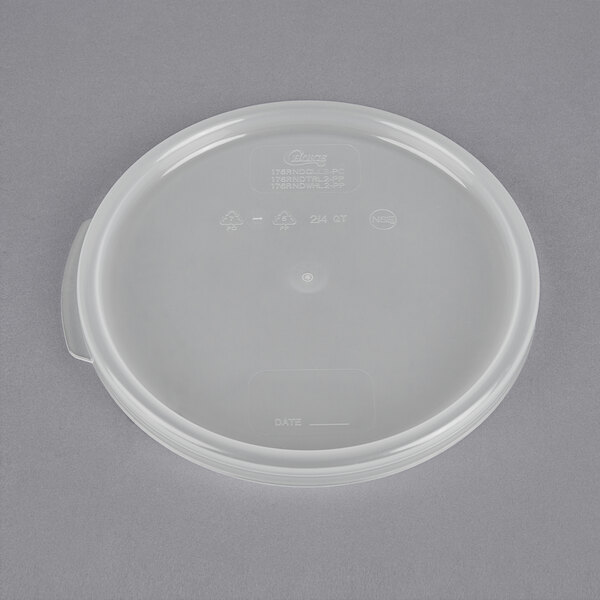 A Carnival King block ice shaver mold in a plastic container with a lid.