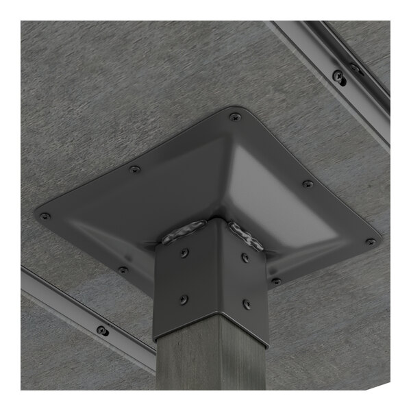 A close-up view of the metal mounting bracket securing a square wooden table leg to the underside of a table with a slate gray finish.