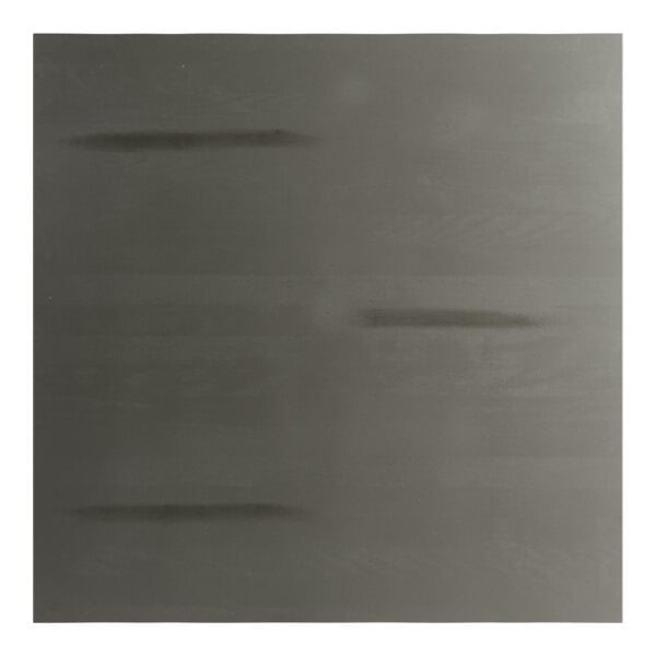 A square, slate gray solid wood table top with a live edge design.