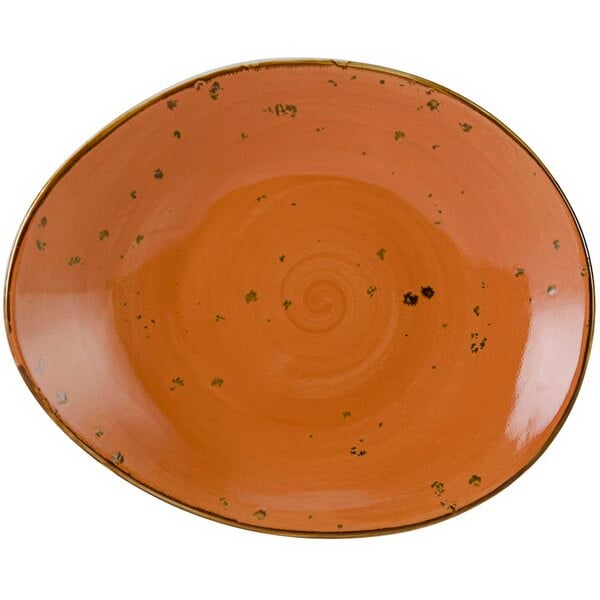 A brown Tuxton china ellipse plate with a swirl design.