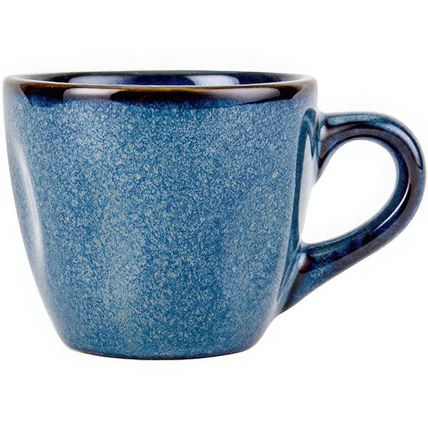 A blue china espresso cup with a handle.