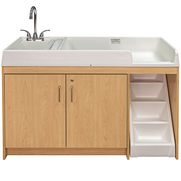 A maple changing table with stairs and a sink.