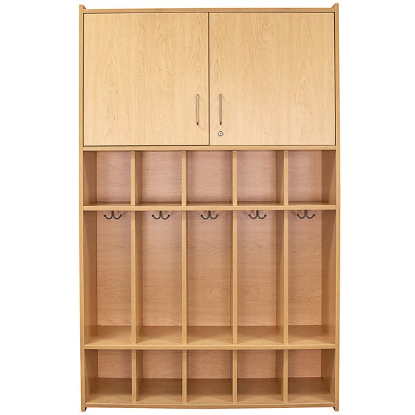 A Tot Mate maple laminate floor locker with shelves and doors.