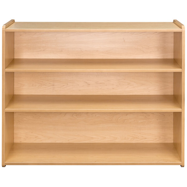 A Tot Mate maple laminate storage shelf with shelves.