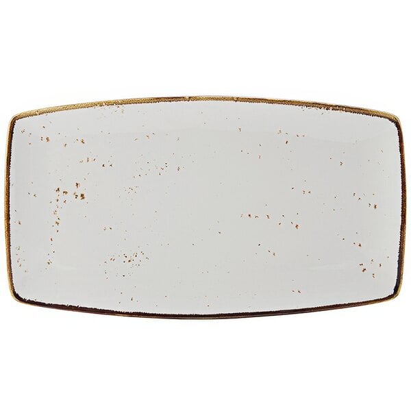 A white rectangular TuxTrendz china plate with gold specks.