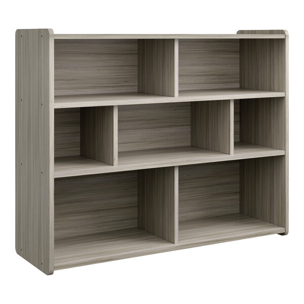 A Tot Mate Shadow Elm laminate compartment storage unit with shelves.