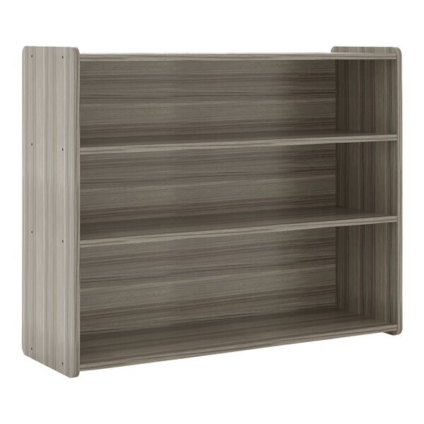 A Shadow Elm laminate school age storage shelf with three shelves.