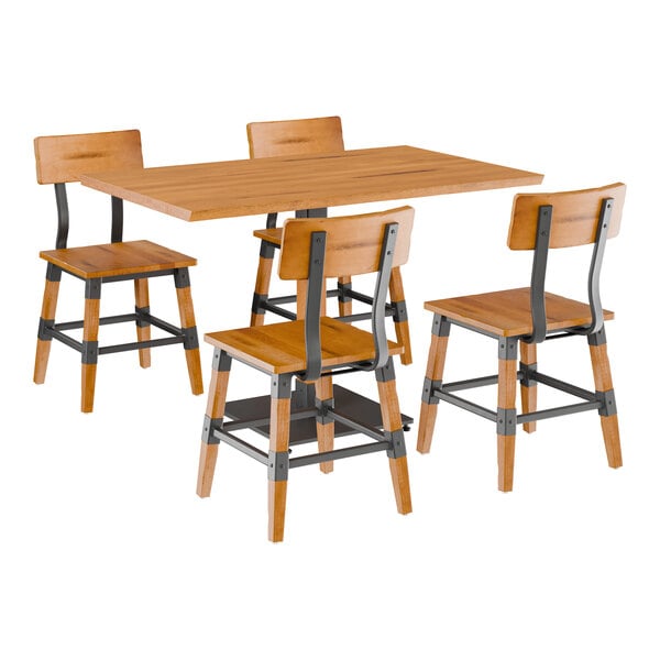 A Lancaster Table & Seating honey maple wood table with a live edge and metal legs with 4 chairs.