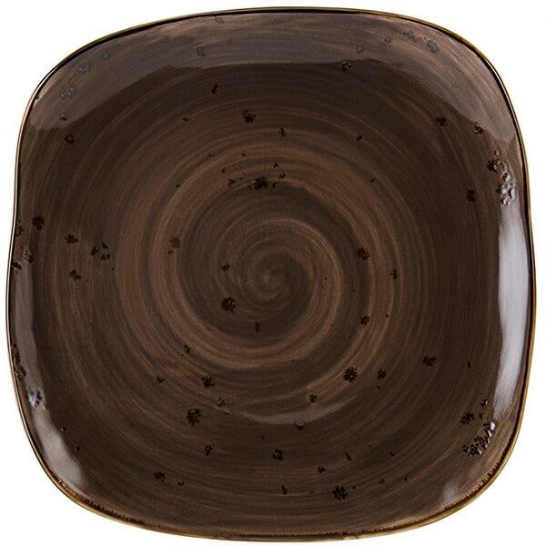 A brown square Tuxton china plate with a swirl pattern.