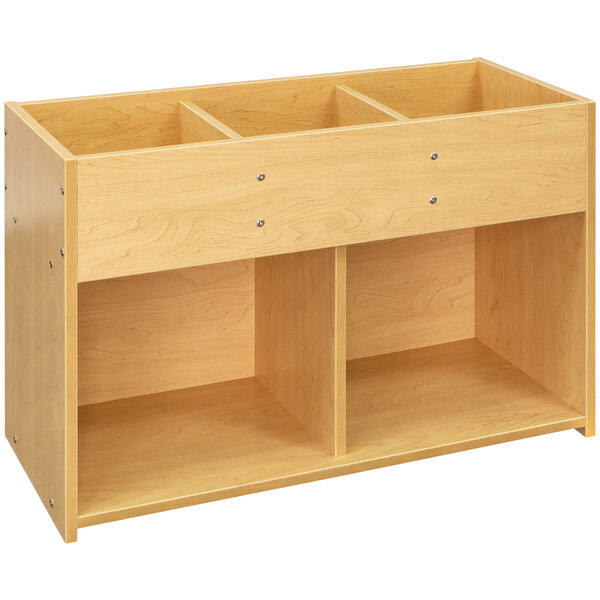 A Tot Mate maple laminate book and toy storage unit with two shelves and three compartments.