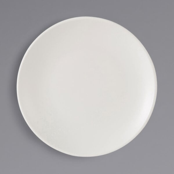 A Tuxton TuxTrendz white coupe china plate.