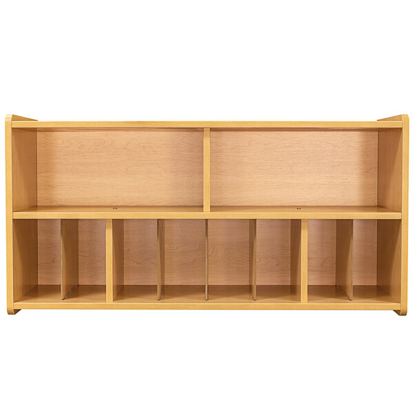 a wooden shelf with empty shelves