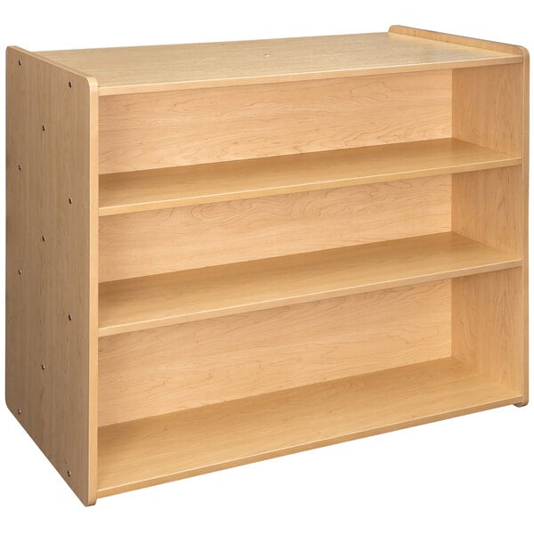 A Tot Mate maple laminate wooden school age storage shelf with shelves on both sides.