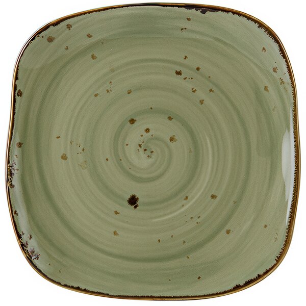 A close up of a Tuxton square china plate with a green and brown swirl pattern.