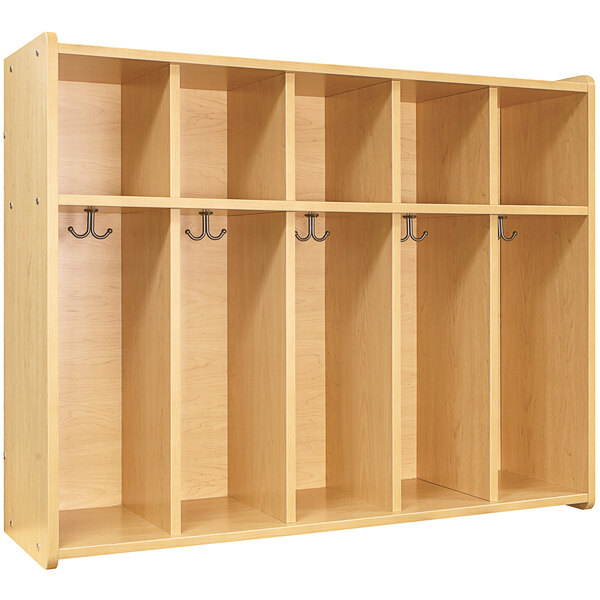 a wooden locker with hooks