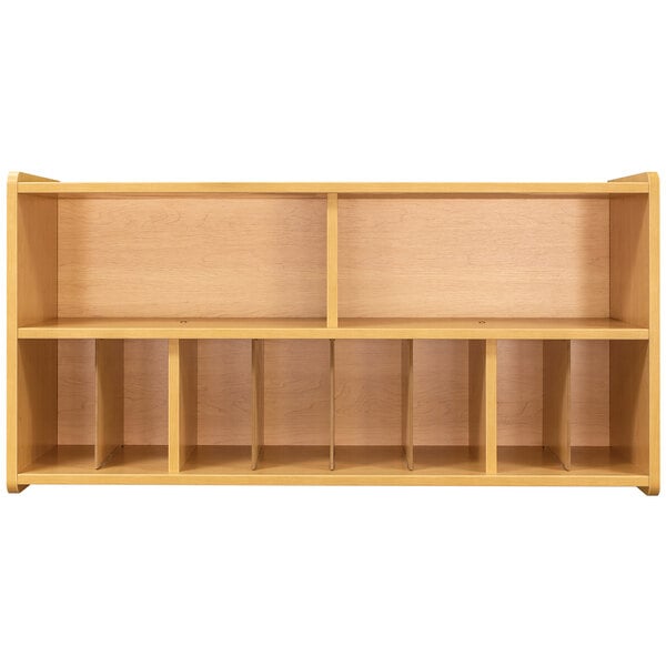 a wooden shelf with empty shelves