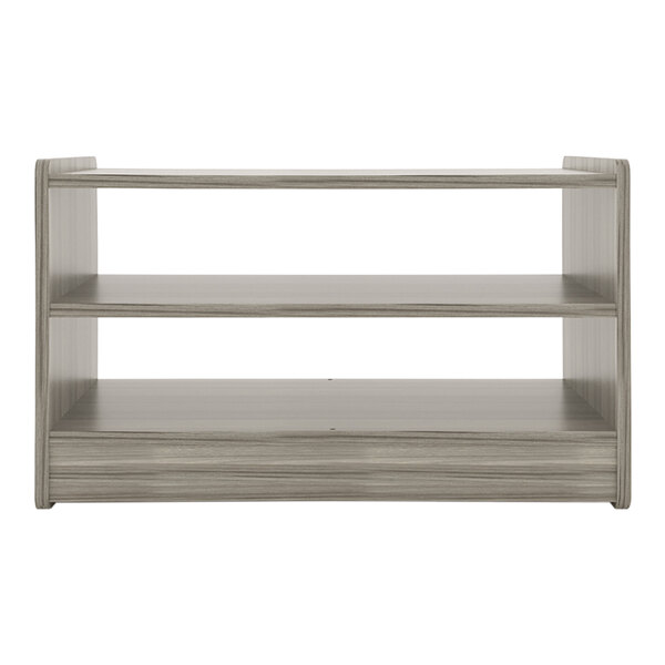 A shadow elm wood Tot Mate toddler play center with two shelves.