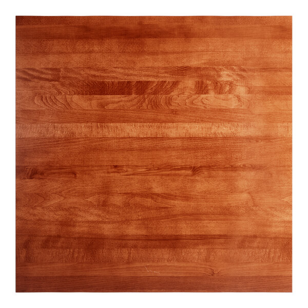 A square solid wood table top with a rustic mahogany finish.