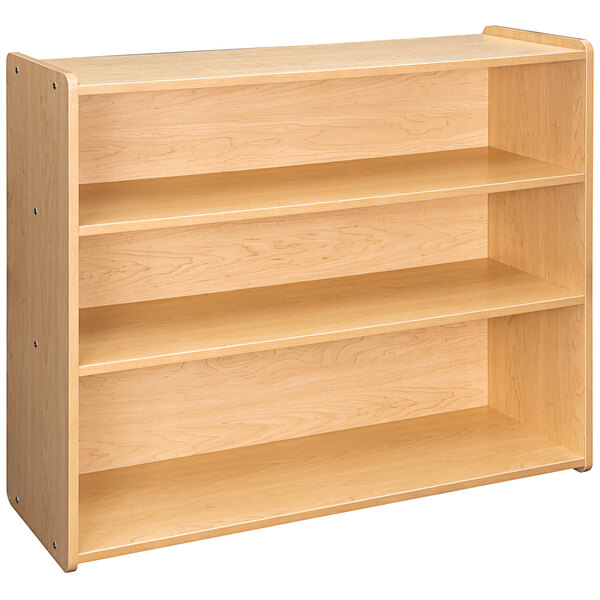 A Tot Mate maple laminate school age storage shelf with three shelves.