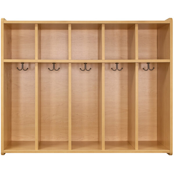A wooden locker with five sections, each with hooks.