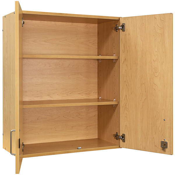 A Tot Mate maple wooden wall cabinet with shelves and two doors open.