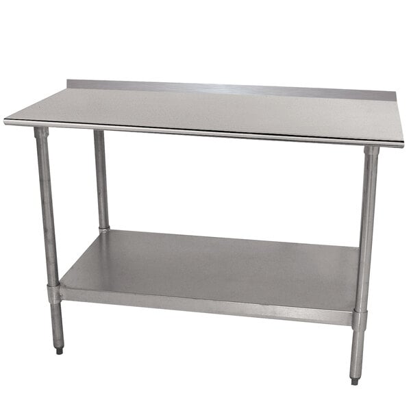 An Advance Tabco stainless steel work table with undershelf.